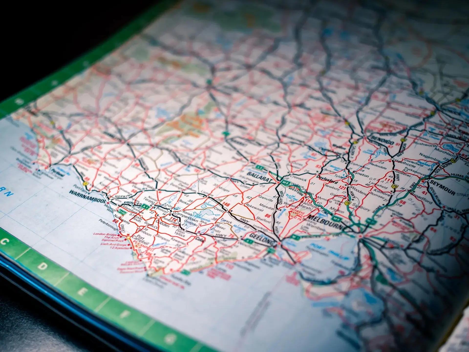 Paper map and compass on a table